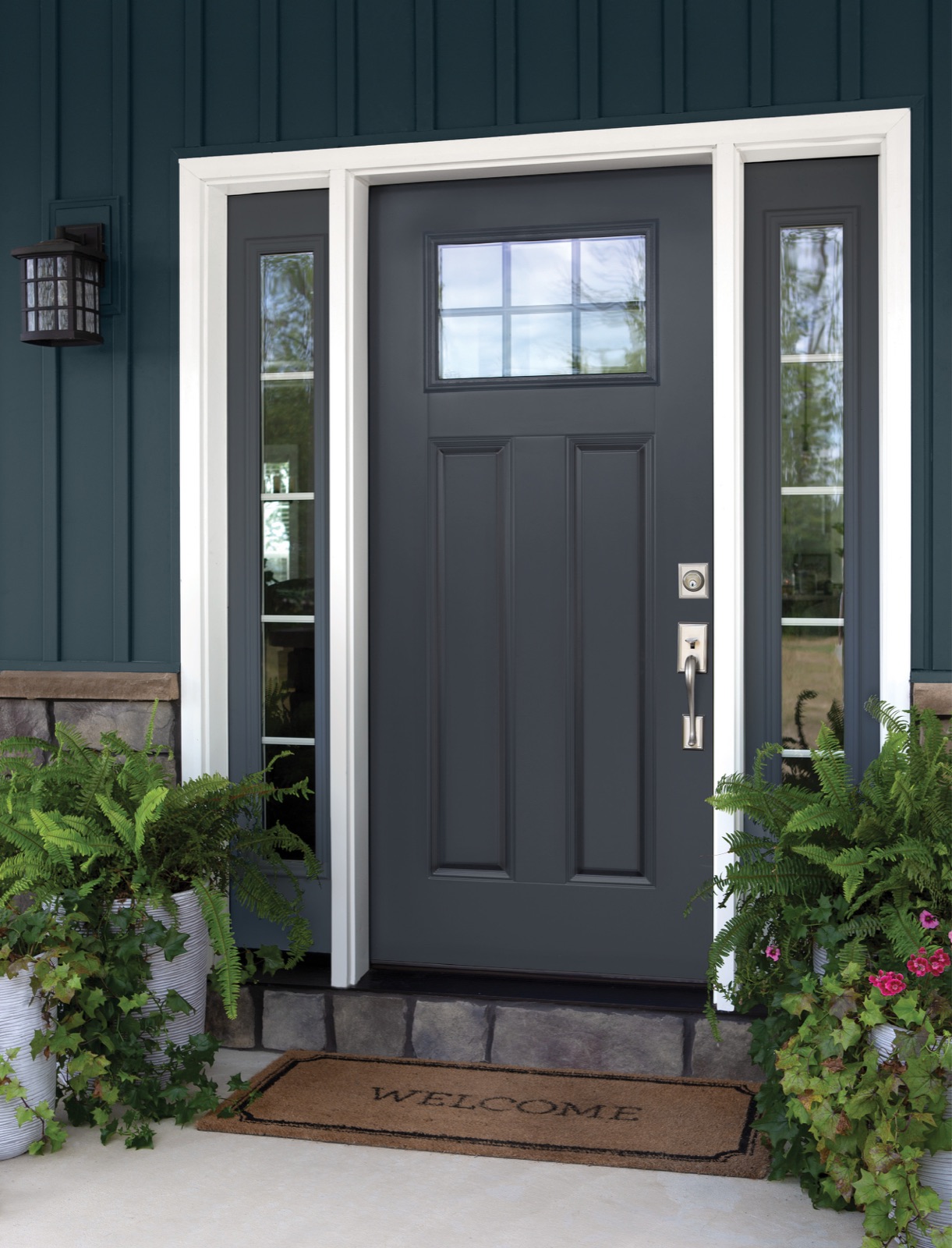Black entry door with sidelites