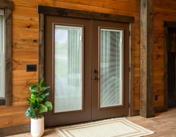 Tudor brown exterior French doors with internal blinds