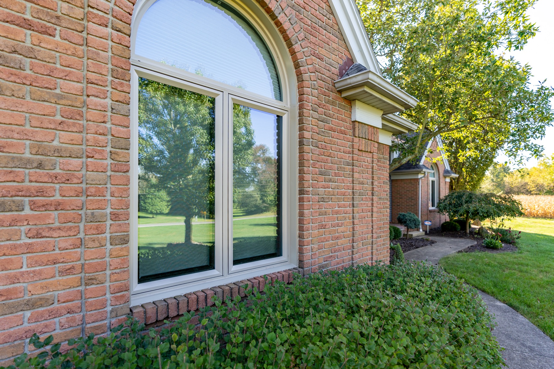 Replacement windows on a Zionsville style brick home