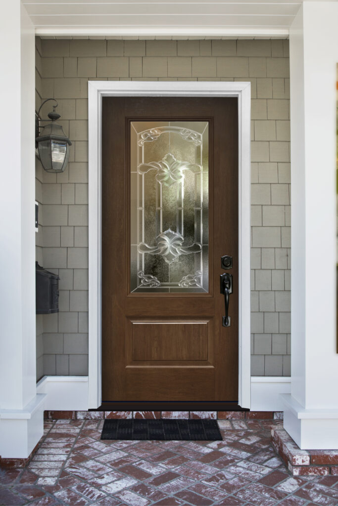 White front door of an upscale home with wreath